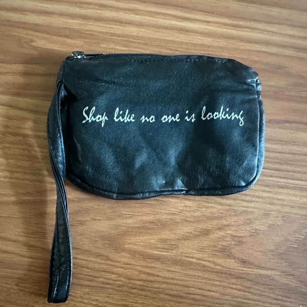 Small wristlet or coin purse. Black
